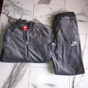 Women’s grey Nike velour set.
